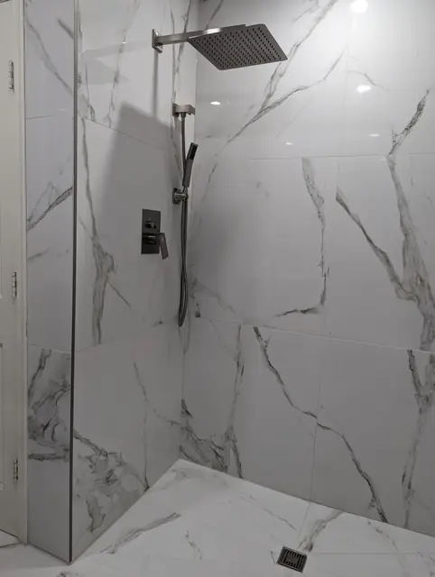 Marble-Look Hall Bathroom — 1 of 10