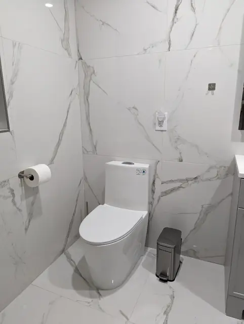 Marble-Look Hall Bathroom — 5 of 10