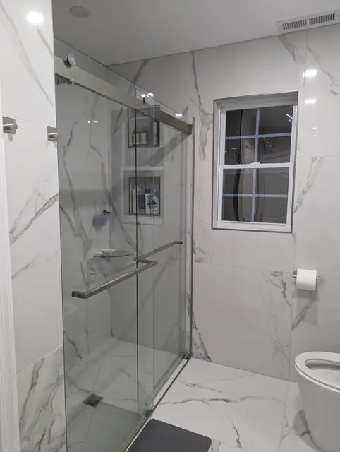 Marble-Look Hall Bathroom — 10 of 10