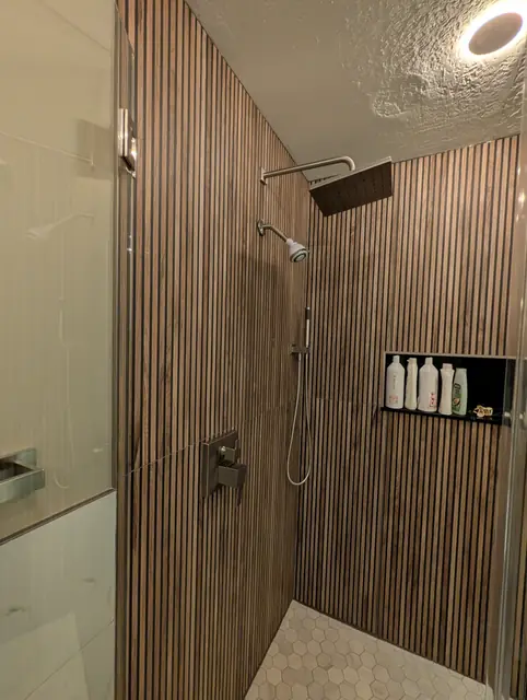 Wood-Slat Spa Bathroom — 6 of 8